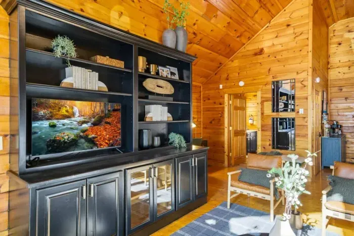 Relax with the TV, and enjoy a selection of card and board games located in the black cabinet.