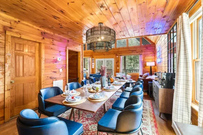 Spacious dining table seating up to 10 guests with 2 high chairs for little ones