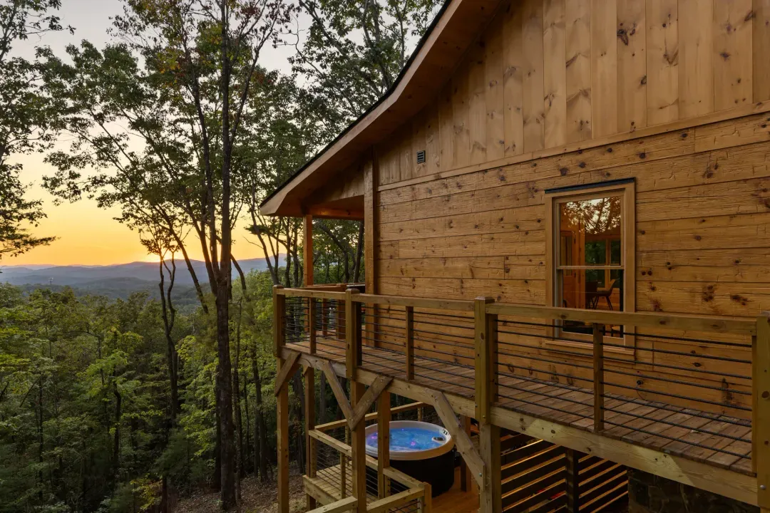 Sunset mountain-view cabin with elevated deck and private hot tub