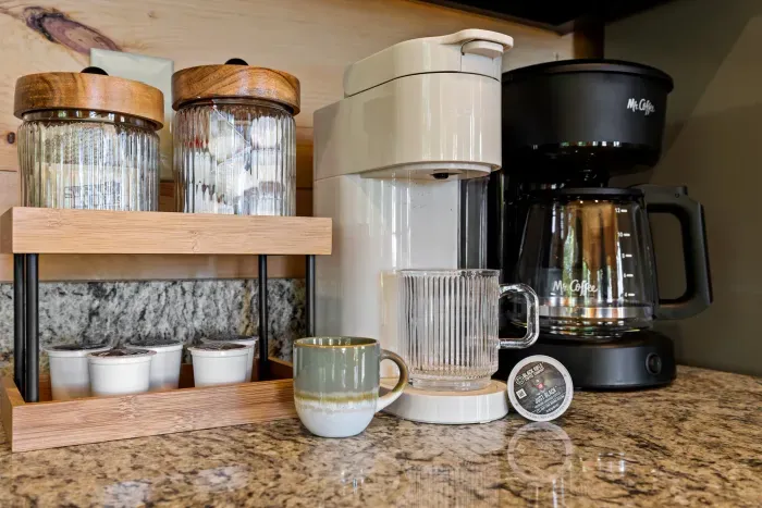 Convenient coffee bar with pod brewer, drip maker, and stocked essentials