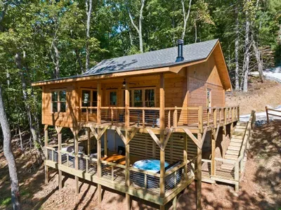 Secluded forest cabin with wraparound deck and private hot tub