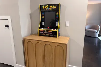 Pac-man arcade game in basement