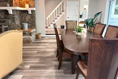 Dining room off living room, apart of open concept floor plan