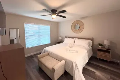 Primary bedroom with smart TV