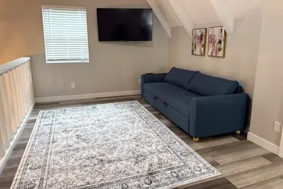 Upstairs loft space with cozy space, full pull out bed
