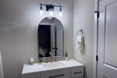 Primary en suite bathroom with spacious shower