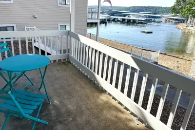 Patio space right outside front door overlooking pool and lake.