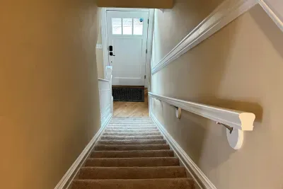 Steps to downstairs, main floor