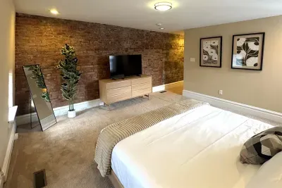 Wide view of primary suite on top floor