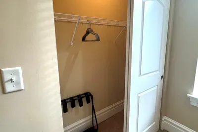 Closet of guest bedroom #2, queen size bed