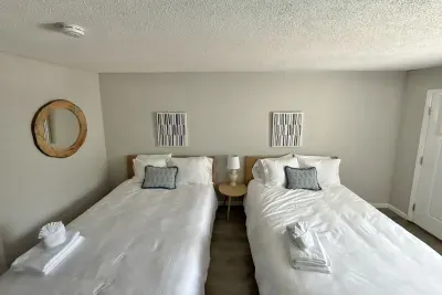 hotel style unit with 2 queen beds