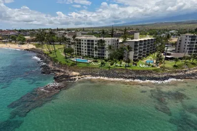 Waterfront image, condo on the right building. Coral just outside they has sea turtles to see!