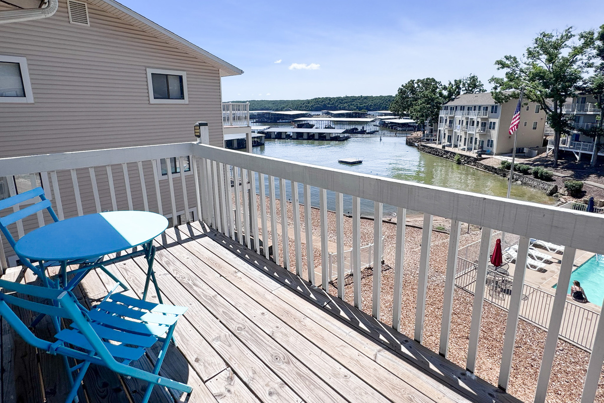 Private balcony and lake view from Kapilana Cozy Cove Cabin 18