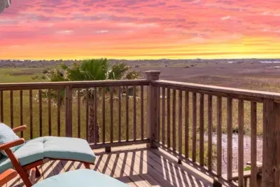 Stunning sunset views over the private backyard and marsh.