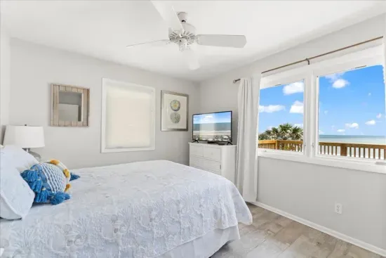 queen bedroom with ocean views