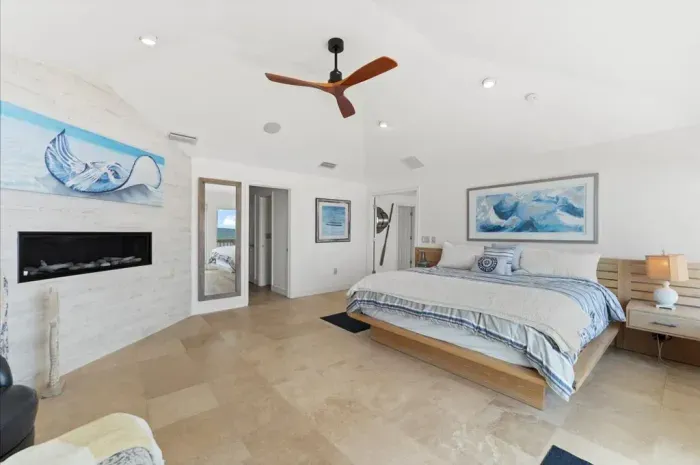Large upstairs master suite w/ ocean views and deck access