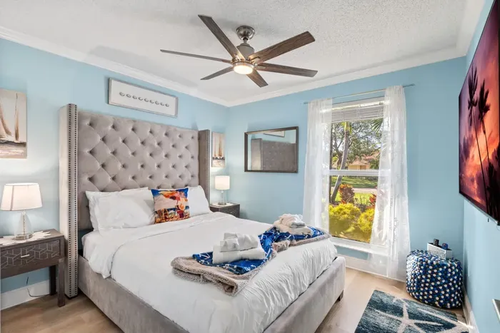 Moving on into the 2nd bedroom, this spacious room is fitted with a queen sized bed and 55” HDTV allowing you to have your own private entertainment before drifting off to sleep.