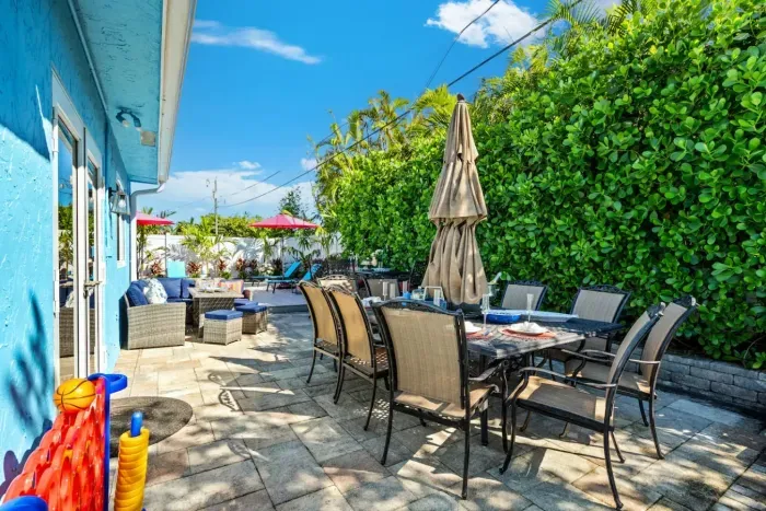 The dining/lounge area perfectly connects to the swimming pool.