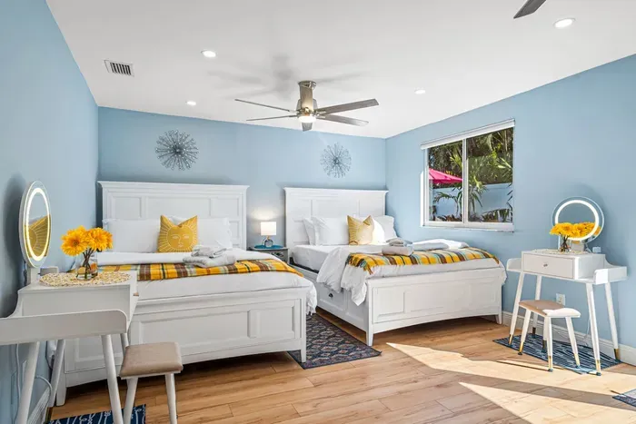 This bedroom also features 2 makeup vanities.