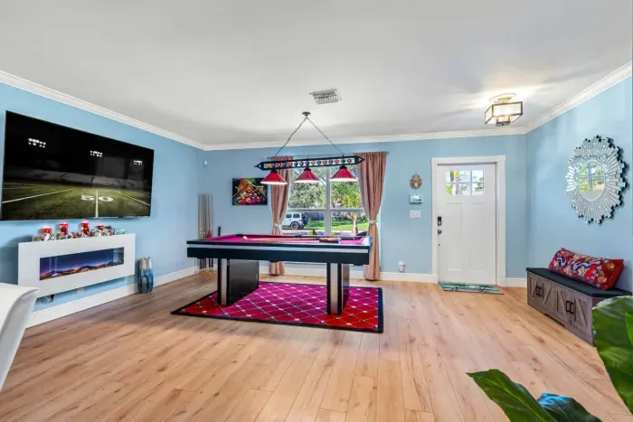 Enjoy the fireplace and watching games on the TV as you shoot some pool!