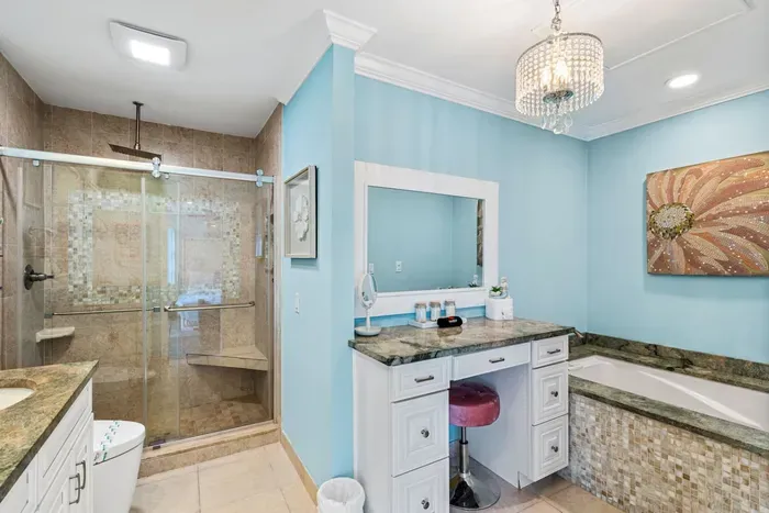 Welcome to your very own ensuite bathroom with a stunning walk in shower, soaking tub for a relaxing bath, makeup vanity, and smart toilet bidet.