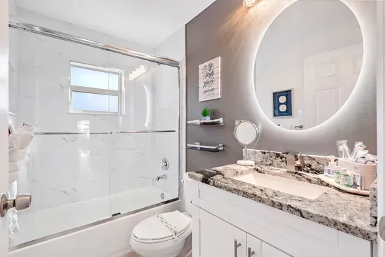 Welcome into the 2nd bathroom with yet another beautiful shower area this time with a bath combo - let the water wash away your stresses of the modern day hustle and bustle and get you ready for the fun day ahead.