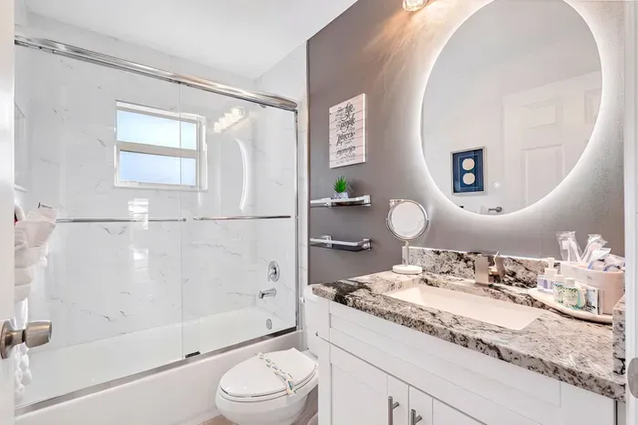 Welcome into the 2nd bathroom with yet another beautiful shower area this time with a bath combo - let the water wash away your stresses of the modern day hustle and bustle and get you ready for the fun day ahead.