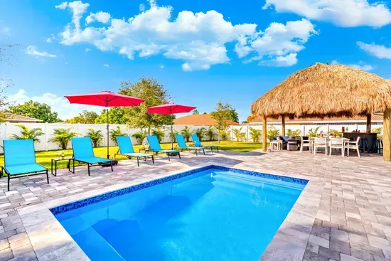 Welcome to your next stunning retreat hidden away at Delray Beach!  Starting off with the private patio pool area with sun loungers and outdoor furniture seating under the amazing Tiki Hut - creating everlasting memories in this private oasis!