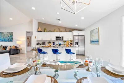 Once your kitchen creations are done, head to the glorious glass dining table with a unique light above. Take a seat on one of the 6 chairs and enjoy your evening meal together with your loved ones.