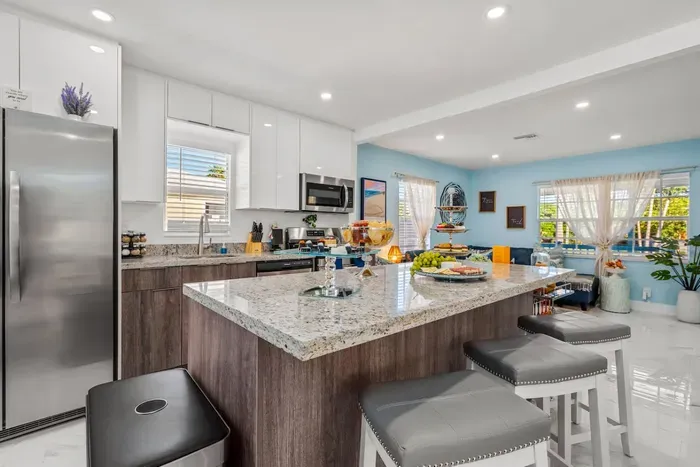 The kitchen island is the centerpiece of the living area.