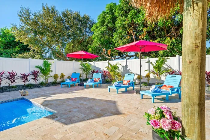 Soak up the Florida sun on comfortable loungers by the pool.