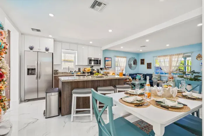 Host elegant dinner parties at the stylish dining table with seating for six guests