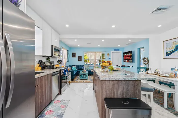 Whip up culinary delights using state-of-the-art appliances in this fully equipped gourmet kitchen