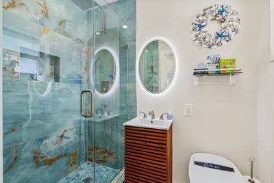 Feel like a movie star while getting ready in front of the lighted mirror.