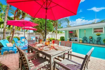 Sit down for a mouthwatering al fresco meal by the pool.