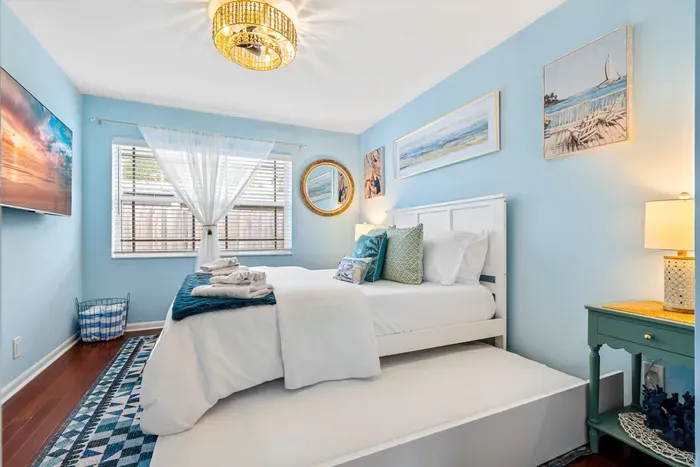 Another comfy trundle can be found in this bedroom.