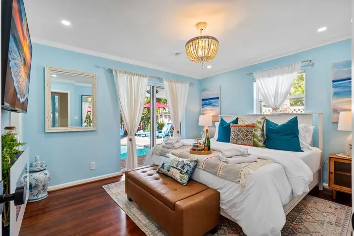 Sleep like a royal family member on the king-size bed found in the master bedroom.