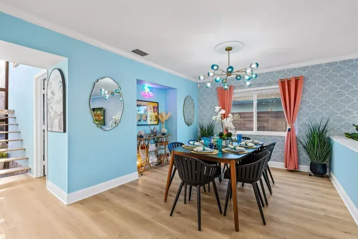 Create memories over meals in a bright, welcoming dining area that fits the home’s spacious, open-concept flow.