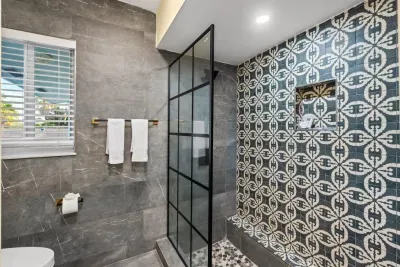 Spa-like bathrooms with modern finishes give your group a clean, refreshed feel after pool days, beach trips, and boating adventures.