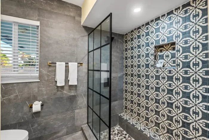 Spa-like bathrooms with modern finishes give your group a clean, refreshed feel after pool days, beach trips, and boating adventures.