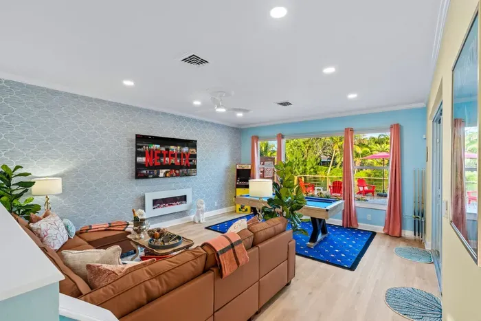 Bright, open-concept living space that creates a welcoming home base for your Fort Lauderdale vacation, from mornings in to evenings out.