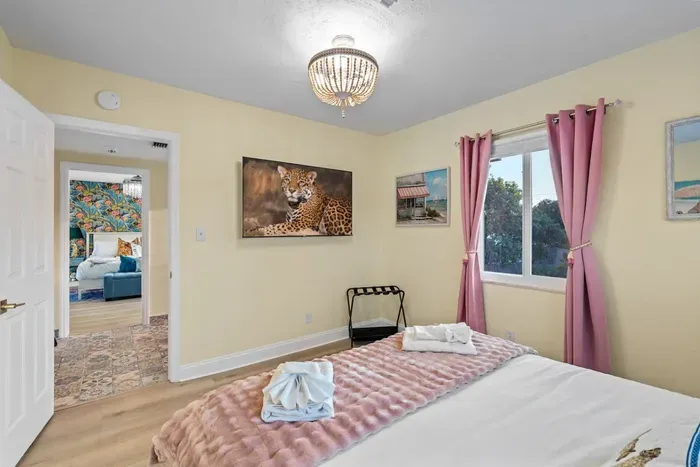 Unwind after the pool in a comfortable space with a large Smart TV and cozy bedding for restful nights.