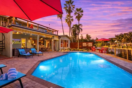 Waterfront • Htd Pool • Billiards • Deck • Lanai