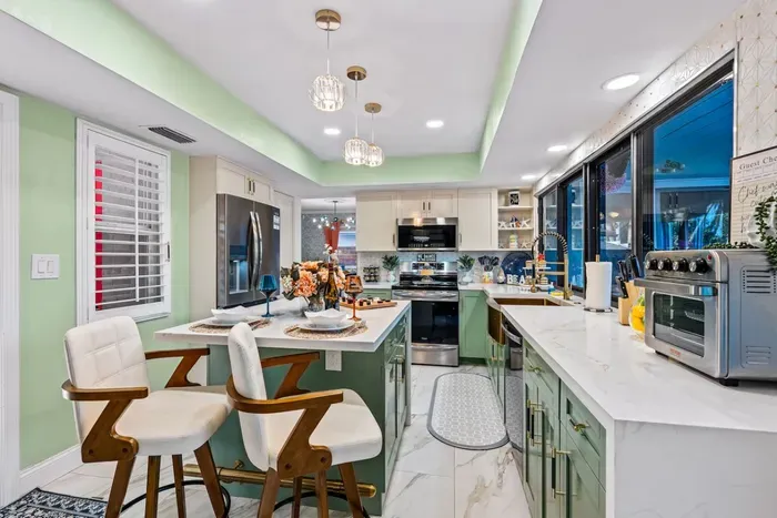 Perfect for entertaining, with an open layout that keeps the conversation flowing from the kitchen to the dining and living areas.