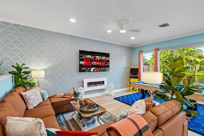 Spacious living room designed for groups to lounge comfortably, with an open layout that makes it easy to relax and connect.