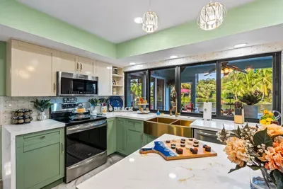 Spacious open-concept kitchen with room for multiple cooks, making group meals, snacks, and holiday-style dinners easy and enjoyable.