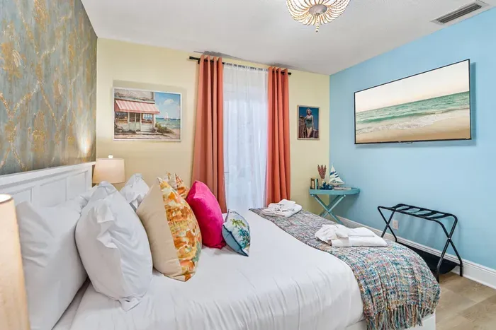 Spacious sleeping setup with a queen bed and a trundle, providing room for everyone to spread out.