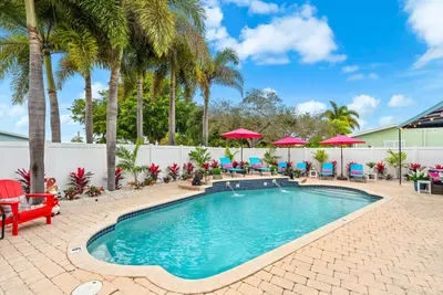 Private heated pool in Lighthouse Point! Enjoy comfortable swims year-round in your own sunny backyard oasis.