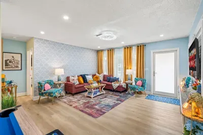 Coastal South Florida vibe in a welcoming living room—your home base near beaches and attractions.