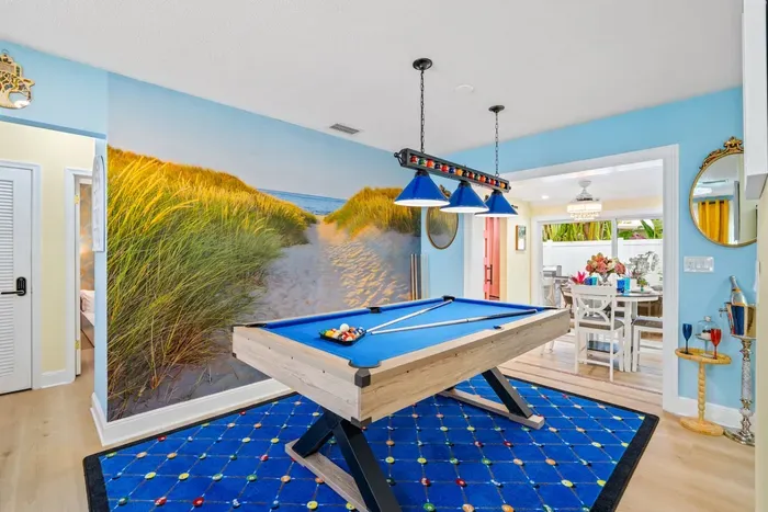 Rainy-day or late-night fun: shoot pool indoors in a comfortable home built for relaxing together.